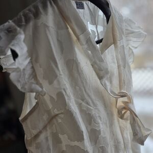 Elegant Cream Blouse with Ruffle Sleeves